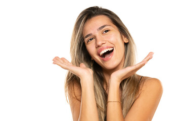 beautiful young happy women with long balayage painted hair and no makeup on a white background.