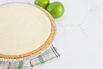 Key Lime Pie in a Graham Cracker Crust on a Kitchen Counter