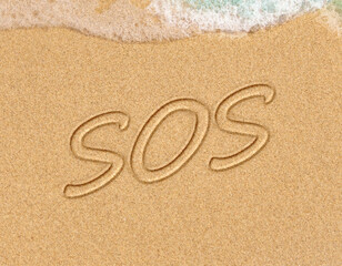 Environmental problem. Ecology concept. Plastic on the beach with sos writing. Spilled garbage on the beach BANNER, LONG FORMAT