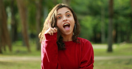 Girl having an idea feeling surprised. Young woman having an epiphany enlightenment