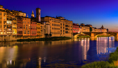 Fototapeta na wymiar Ponte Santa Trinita bridge on Arno River at sunset, Florence, Italy at sunset