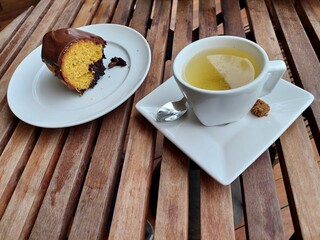 Cup of tea with a chocolate cake