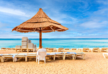 Morning on sandy beach at the Red Sea near Eilat - famous tourist resort and recreation city in Israel