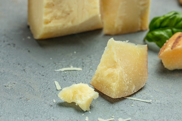 Traditional Gravyer Gruyere Cheese hard yellow cheese without holes, with a dark crust and a pleasant floral and nutty aroma, place for text, top view