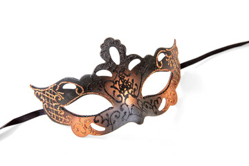 Carnival Venetian mask with brown and gold colors isolated on white