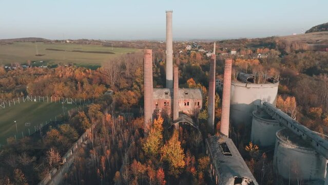 Abandoned old production plant, cement plant in Bedzin, Grodzisk, Poland. Concept of abandoned places, industrial ruins, urbex. View from the drone, air.