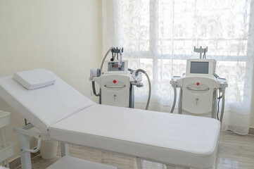 Laser epilation machine with 2 white bads in the beauty salon. Laser systems and devices for...