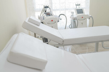 Laser epilation machine with 2 white bads in the beauty salon. Laser systems and devices for aesthetic medicine and surgery. Cosmetology devices.Modern ways of relaxation and skin care.