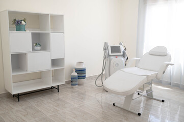 The sculp body treatment machine with a white bad in the white room, cabinet in the cosmetology, beauty center, clinic, salon.Cosmetology devices.Modern ways of relaxation and skin care