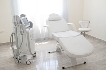 The sculpt body treatment machine with a white bad in the white room, cabinet in the cosmetology, beauty center, clinic, salon.Cosmetology devices.Modern ways of relaxation and skin care