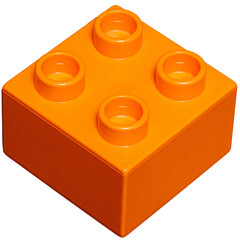 Fototapeta premium Orange plastic building block with studs.