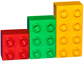 Three plastic building blocks with studs standing next to each other.