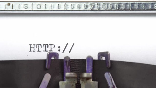 HTTP web word closeup being typing and centered on a sheet of paper on old vintage typewriter mechanical