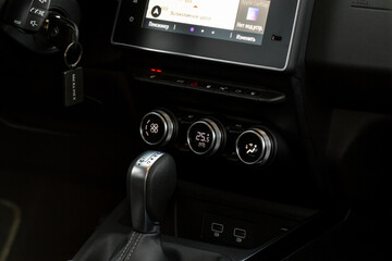 Car air conditioner dashboard. Modern car interior. Adjustable air conditioner. Car air conditioning system.