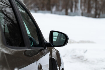 Obraz na płótnie Canvas Rear-view mirror of a modern car.