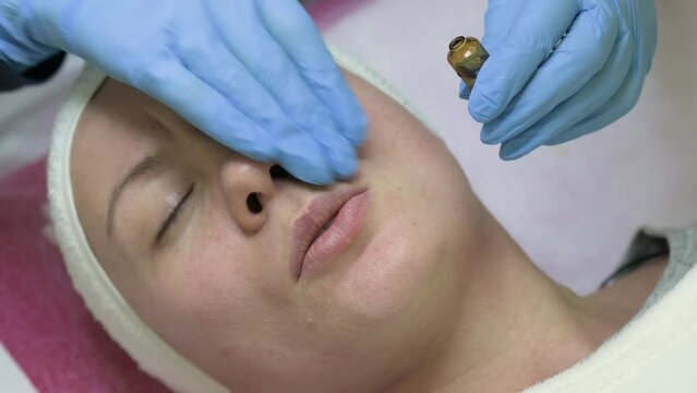 Ampoule with vitamin C for application directly to the face for the procedure of mesotherapy with the help of dermapen, application of liquid to the face.