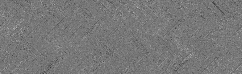 Shabby wooden floor with herringbone pattern made of barn boards. Wood texture background.