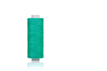 skein of thread green colors macro on a white background