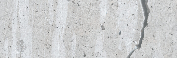 Texture of old cracked concrete wall. Rough gray concrete surface. Great for background and design. Close-up. High resolution.
