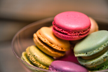 macaroons on wooden table meringue, colourful, sweet food, baked, colours, birthday, pastel, variation, multi colored, party, delicate, purple, luxury, textured, tradition, event, finger