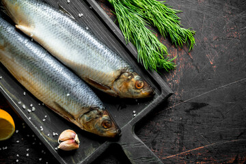 Salted herring with lemon, dill and spices.