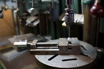Part machining with drilling machine