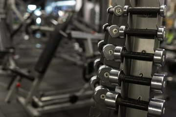 Naklejka premium dumbbells in the gym, sport concept