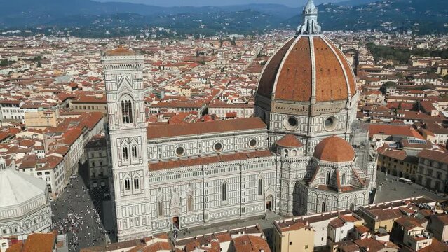 Air close View of the Florence Cathedral, Cattedrale di Santa Maria del Fiore in Firenze, Florence, Italy on a sunny day
