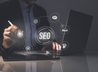 Businessman woks on digital online new marketing business. SEO search engine optimization concept.