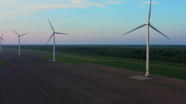 Aerial drone shot of a field with wind turbines in Zeewolde, The Netherlands