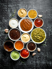 Obraz na płótnie Canvas Bowls with different sauces.