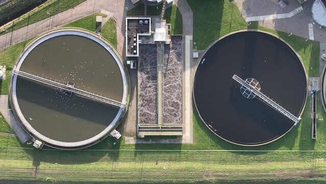 Water filtration installation a process of purifying water using various techniques, systems and equipment to remove impurities and improve water quality. Aerial.