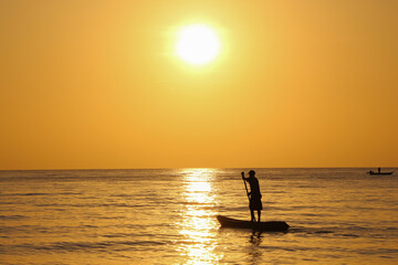 silhouette of a person on a sunset