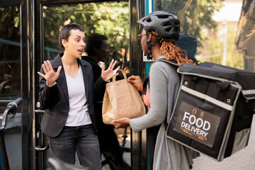 Unsatisfied client refuse taking wrong food order from delivery service courier, angry customer....