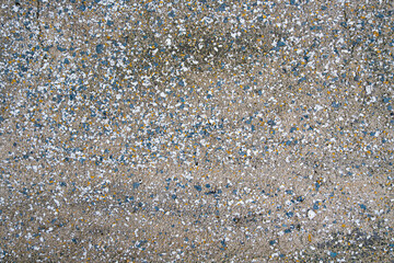 Dirty multi stone color gravel pavement background texture