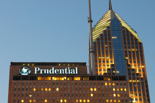 Tops Of Two Chicago Landmark Buildings,  Illuminated At Night, One Prudential Plaza, At Left, And Two Prudential Plaza.