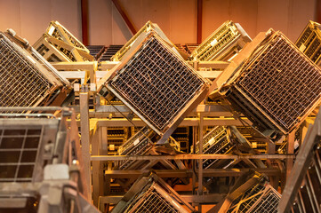 Production of cremant sparkling wine in Burgundy, France. Automatically powered riddling remuage...