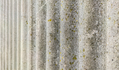 Wall protected with fibre cement corrugated sheets