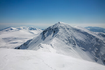 Fototapeta na wymiar Pietrosul Rodnei is the highest peak in all of the Eastern Carpathians