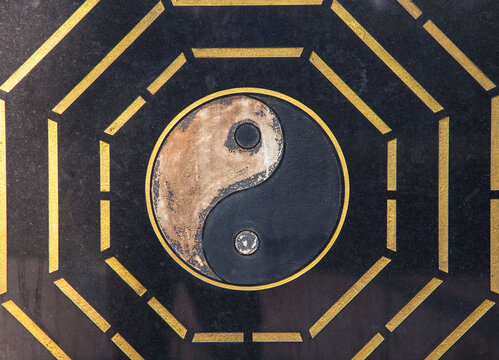 Yin Yang symbol. carved on black marble,