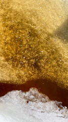 clear ice under dirty water