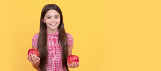 cheerful teen girl hold healthy apple fruit with vitamin. Child girl portrait with apple, horizontal poster. Banner header with copy space.