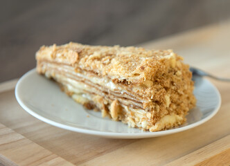 yellow honey cake on white plate