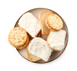 Plate of bread rusks and crackers with cream cheese on white background