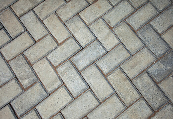 Paving block material that is commonly used for roads or outdoor areas. Stone blocks seamless texture.