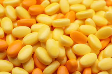 Many bright dragee candies as background, closeup