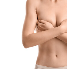 Naked young woman on white background, closeup. Breast cancer awareness concept