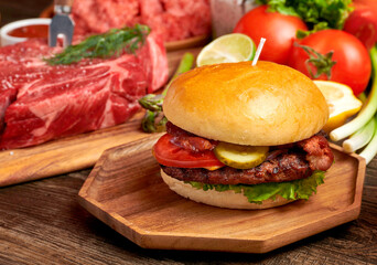 hamburger on a wooden board with meat