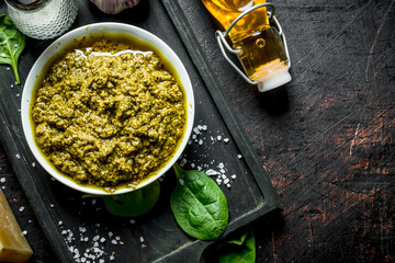Pesto sauce on the cutting Board.