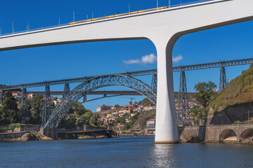 View of three bridges down the Douro River in Porto the Ponte de Sao Joao and Ponte Dona Maria Pia and Ponte Infante Dom Henrique